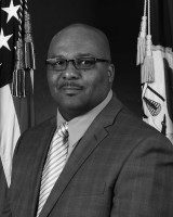 Dennis Bio photo with glass